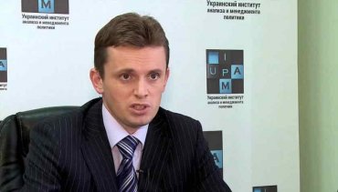 На финансовой игле: политолог рассказал, как корпорации Запада становятся хозяевами Украины