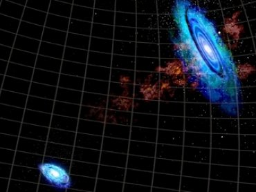 Две галактики соединились водородным мостиком