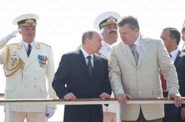 Грустный Янукович и бодрый Путин: о чем говорили и молчали президенты