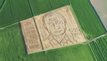 Итальянец трактором нарисовал портрет Путина, заметный из космоса