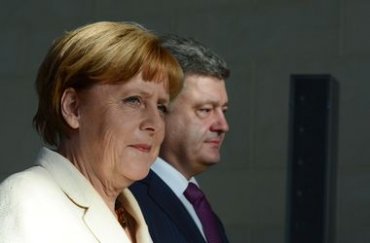 С чем Меркель сегодня прилетит к Порошенко