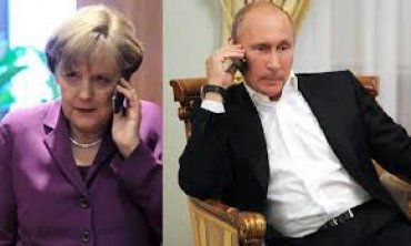 Путин пообещал Меркель прекратить огонь на Донбассе