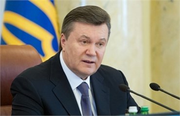Янукович подписал резонансный закон о функционировании платежных систем