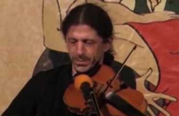 В Запорожье под музыку судили скрипача за убийство матери