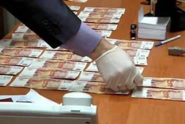В России осторожный чиновник просил положить взятку в унитаз