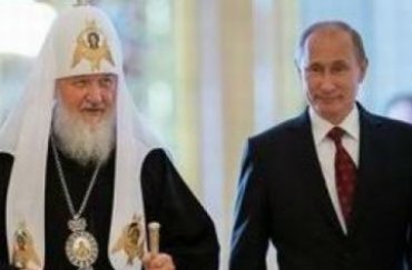 Путин дал патриарху Кириллу орден