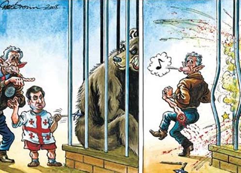 Таким они видят русского медведя. 2008 г.: Джордж Буш сдуру натравил «мальца» Саакашвили на по-прежнему грозного русского медведя. Итог: Мишико разодран в клочья, а Буш делает вид, что он тут ни при чем.