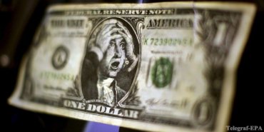 «Черный» доллар захватил Украину