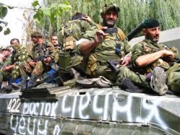 Боевики батальона «Восток» с флагами Южной Осетии – в центре Донецка, люди плачут от счастья