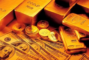 Золото дорожает из-за снижения курса доллара