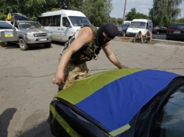 Автомобили киевлян начали «призывать» в армию
