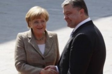 Меркель пообещала Порошенко новые санкции против России