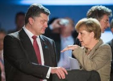Меркель торопит Порошенко с выборами на Донбассе
