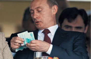 Путин уменьшил себе зарплату