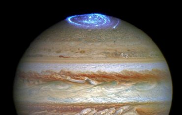 В NASA показали полярное сияние на Юпитере